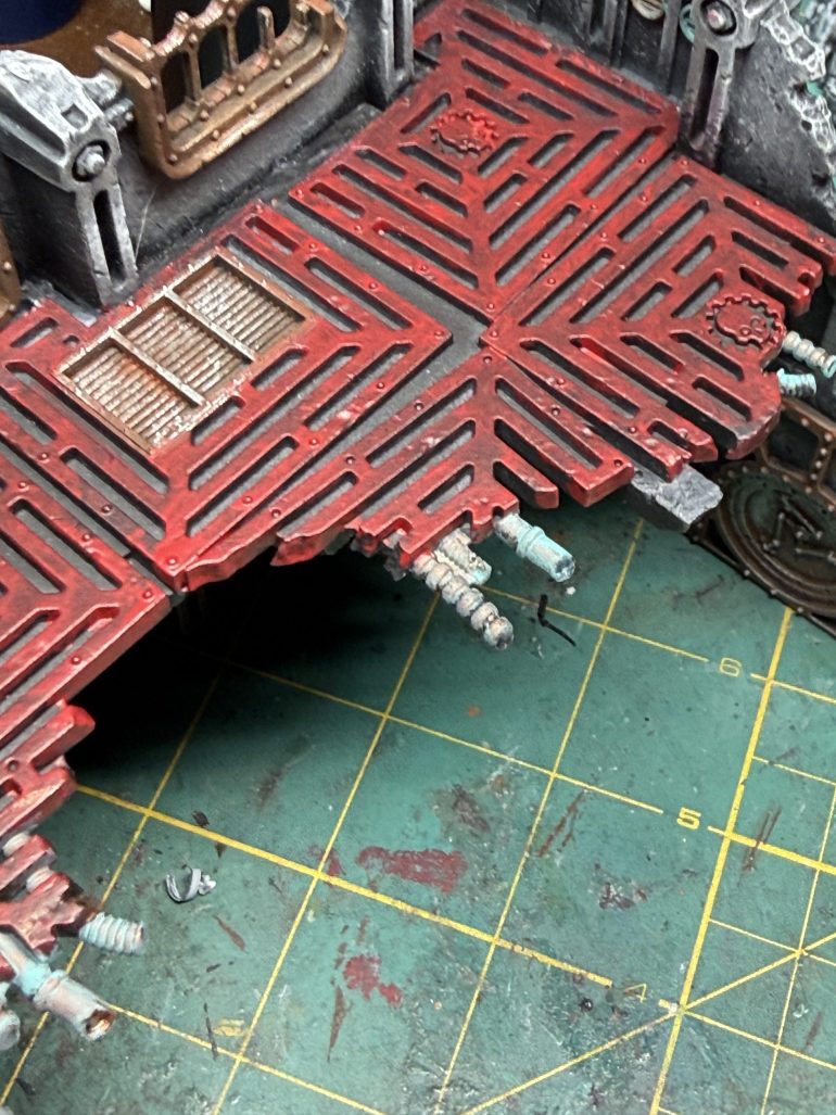 Next, select a color for the floors. I went with the reference video suggested red but it is entirely your choice. Just pick something that will contract with teh rest of teh terrain. While you are at it, paint the details of the floor tiles. I chose not to paint the underside of the floors to save time and because I could not be bothered...