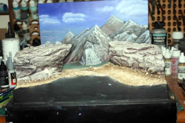 Painted in the ground work in oils as well, and left to dry for two days.