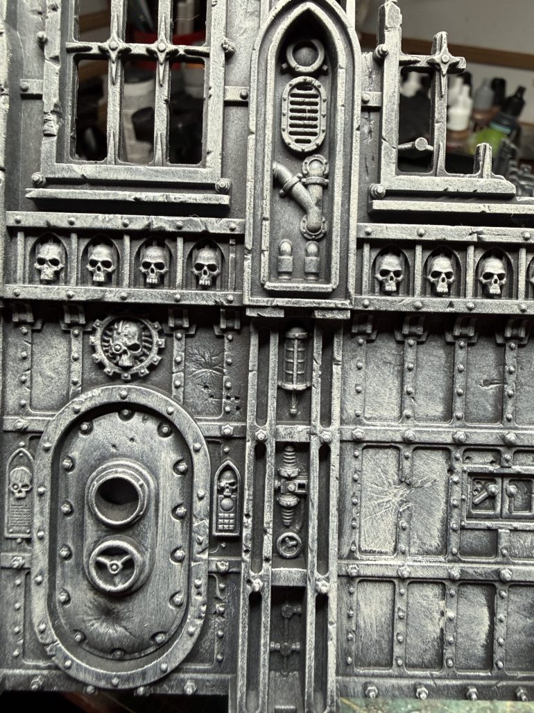 First prime your entire set with flat black, then apply two dry brush layers, one of medium/dark grey, the second of light grey, which should be applied with a lighter touch and upon the areas most exposed to light.