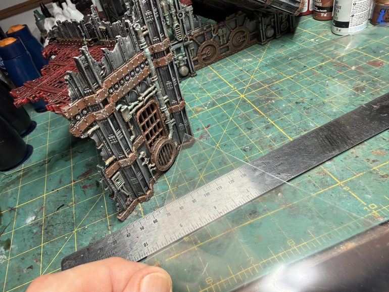 This part is really optional but I loved Alex's addition of broken windows to the terrain. Just pick some old blister or acrylic sheet and cut windows to size for the different areas of the ruins. You may then glue them on the inside of the frames (do not worry, we will hide the seams in the next steps).This may be a bit tedious but it will payoff in the end...