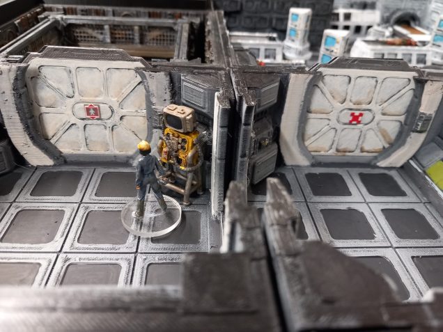 Elevator ho the left and hazard markings gor the morgue 