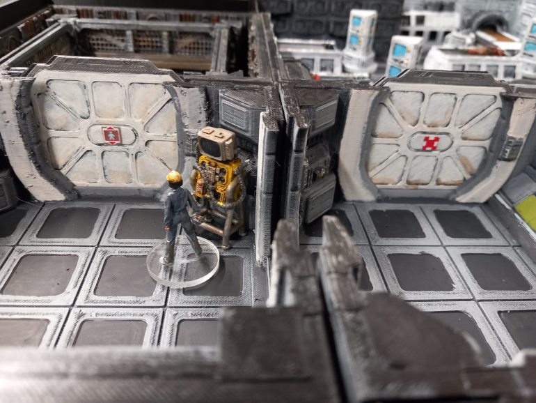 Elevator ho the left and hazard markings gor the morgue 
