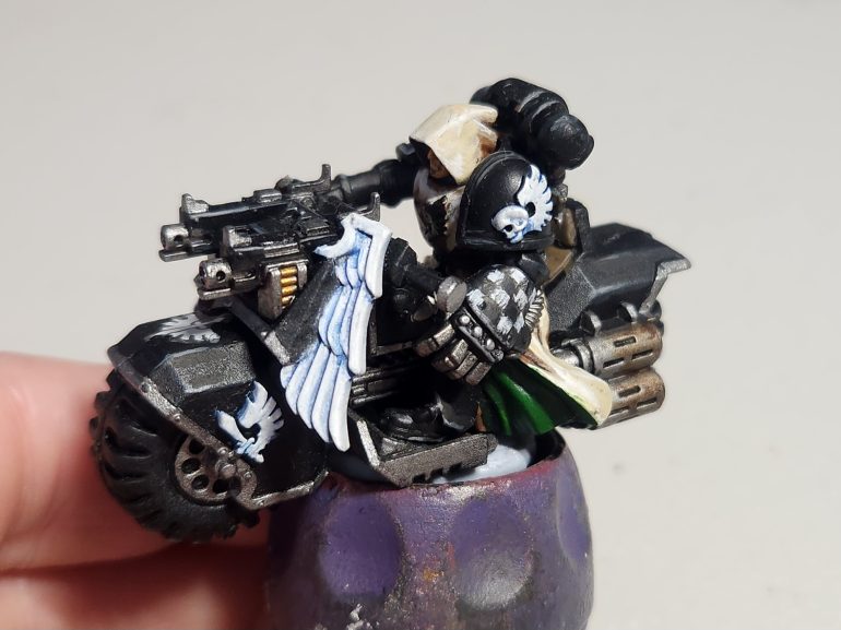 The Veteran Sergeant of the Squadron has a powerfist.