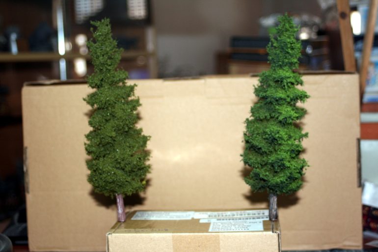 I decided to add two trees to either side of the diorama to help frame the composition better. The tree to the right has been highlighted a bit to give some interest.