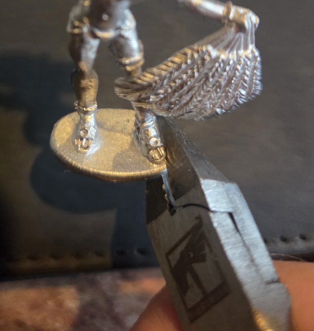 The first cut (is the deepest) carefully aligning my clippers with where the foot joins the base