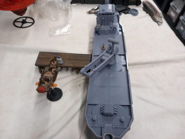 The biggest ship I've printed so far for the game so far and in resin. The cargo ship acts like scenery in the scenarios when our pirates raid it.