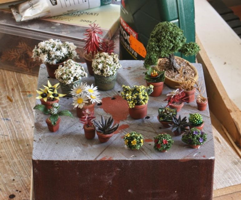 A myriad of pot plants to brighten any diorama.