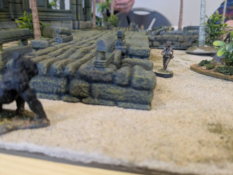 Liliana jones heads gowards the third stone although she can't touch it before her companions reach the second. A random gorilla shows some interest but is scared off by shots 