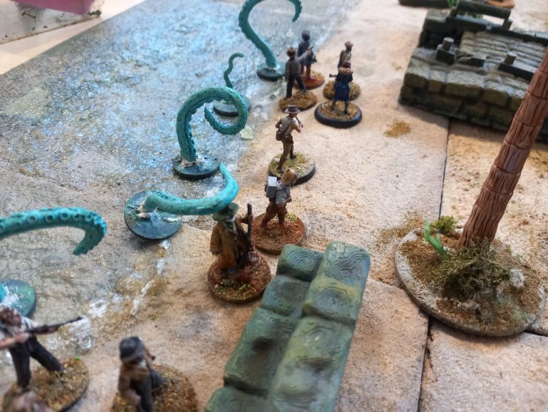 I added a number of random encounters and as the crew begin to explore the water erupts with a mass of tentacles. Each character is struck and if they failed a melee toll they are dragged into the water