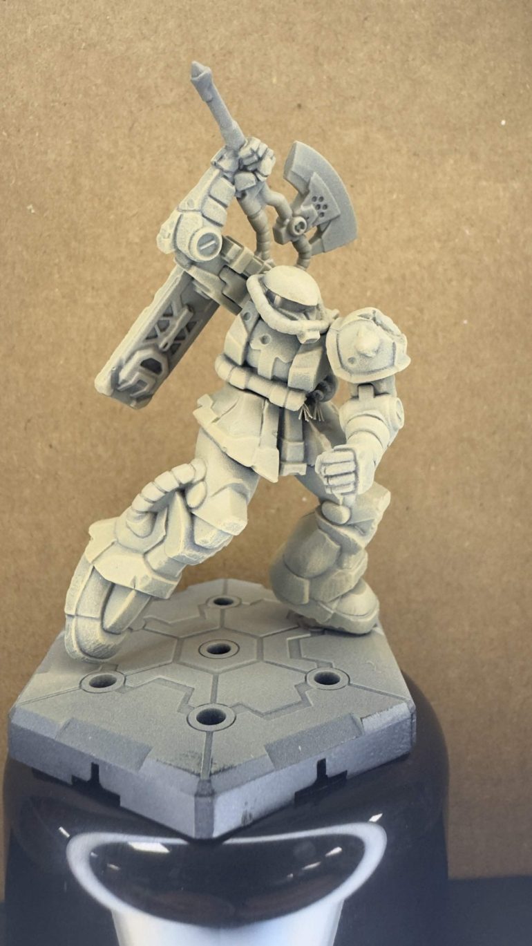 Army Painter Air, thinned roughly 4-1 and applied in three layers, adding two drops of Worn Stone on each application. 