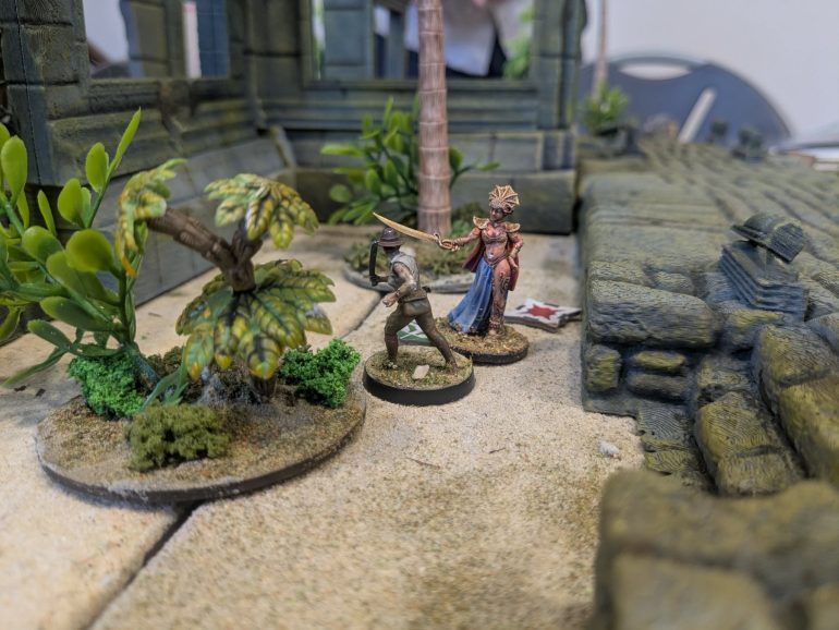 She appears beside liliana jones and attempts go kill the Explorer but quickly teleports away when she realises she's not easily defeated 