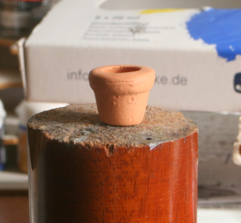A thimble plus putty and paint.