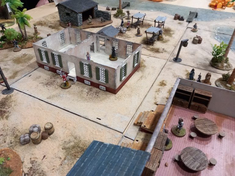 The pirates close in on the governors house using the tavern for cover. Hope. They don't get distracted by rum