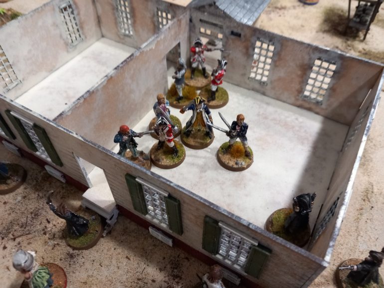 Eventually the pirates and red coats pile into the house. As the daughter swoons she is carried out by a cut throat as bloody melee takes place. A blunderbuss is fired through the window but some how hits no one. Five rolls of a 2. There was an exchange of dice after that.
