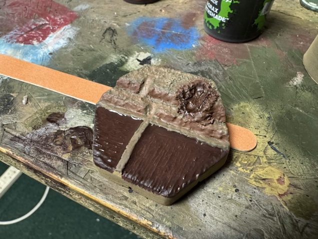 Using several different colours from German Field Grey to Army Painter Oak Brown I set all the base colours for the base. 