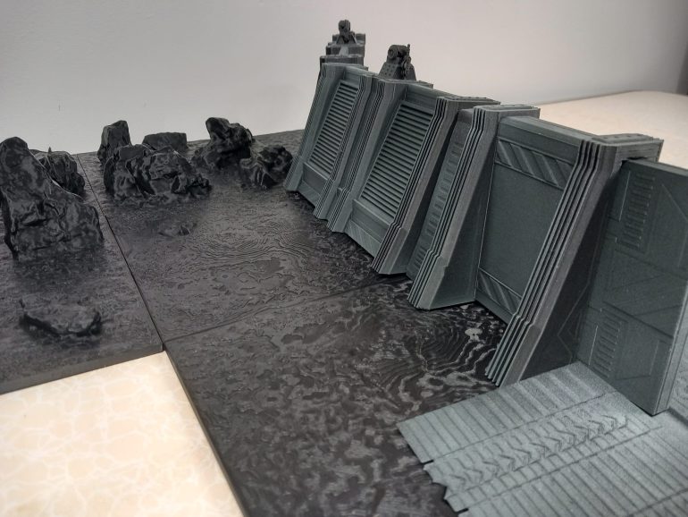 Lv427-designs has produced stl files for colony walls which have history Hadleys Hope appearance and comes with a gate way. I'm printing a table to go with it.
