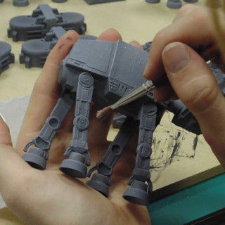 Dry brushing the At-Ats for battle